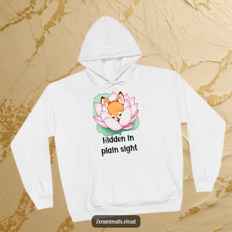 Funny curious fox peeking from a giant lotus flower on a hoodie, offering cozy enchantment and humor.