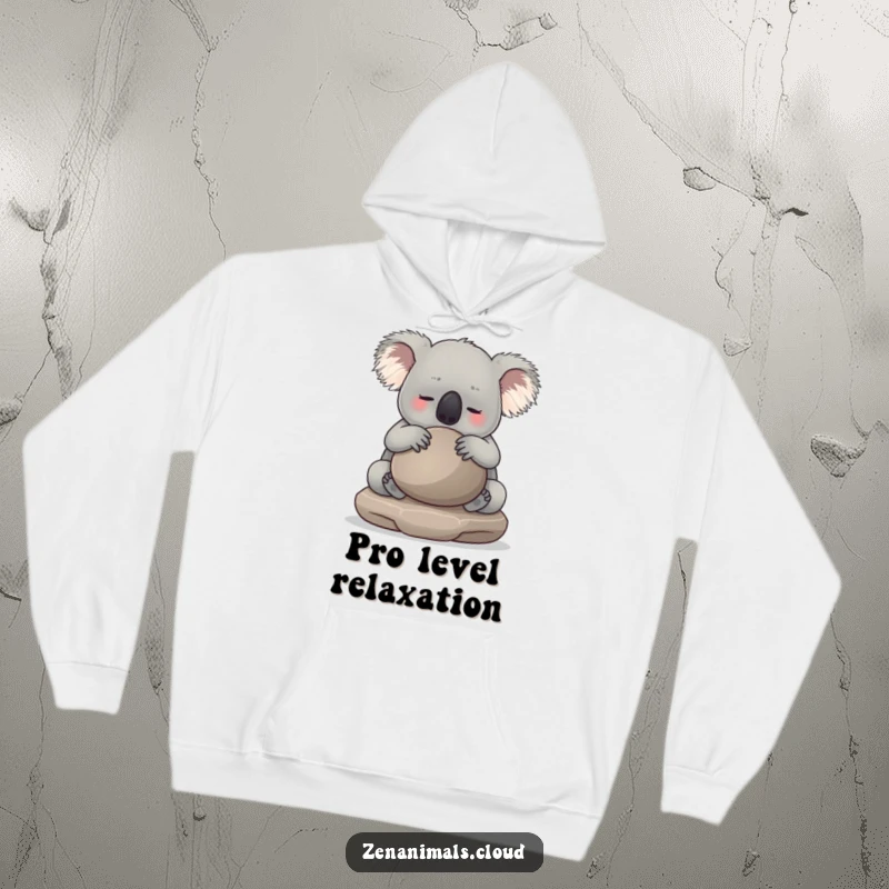 Funny koala hugging a smooth meditation stone while wearing a cozy hoodie, radiating peace and comfort. A hilarious gift idea.